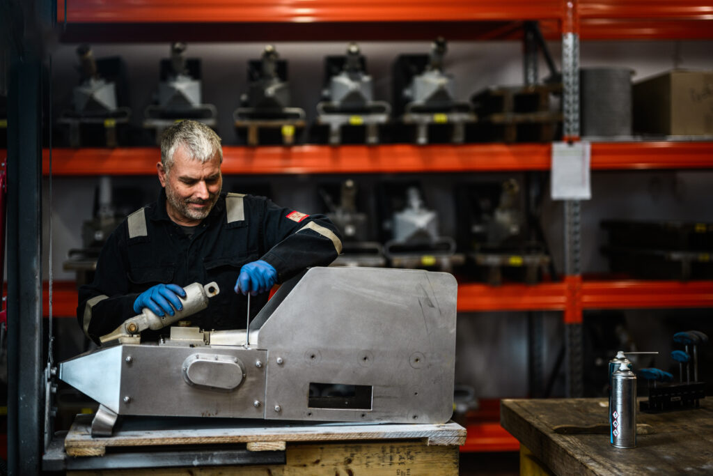 CPR Survey Workshop Assistant (Mechanical) Peter Ockenden does maintenance on a CPR unit.